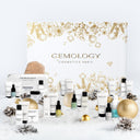 Calendrier de l’Avent 2025 Gemology avec coffret blanc et doré et 24 soins visage et corps exposés